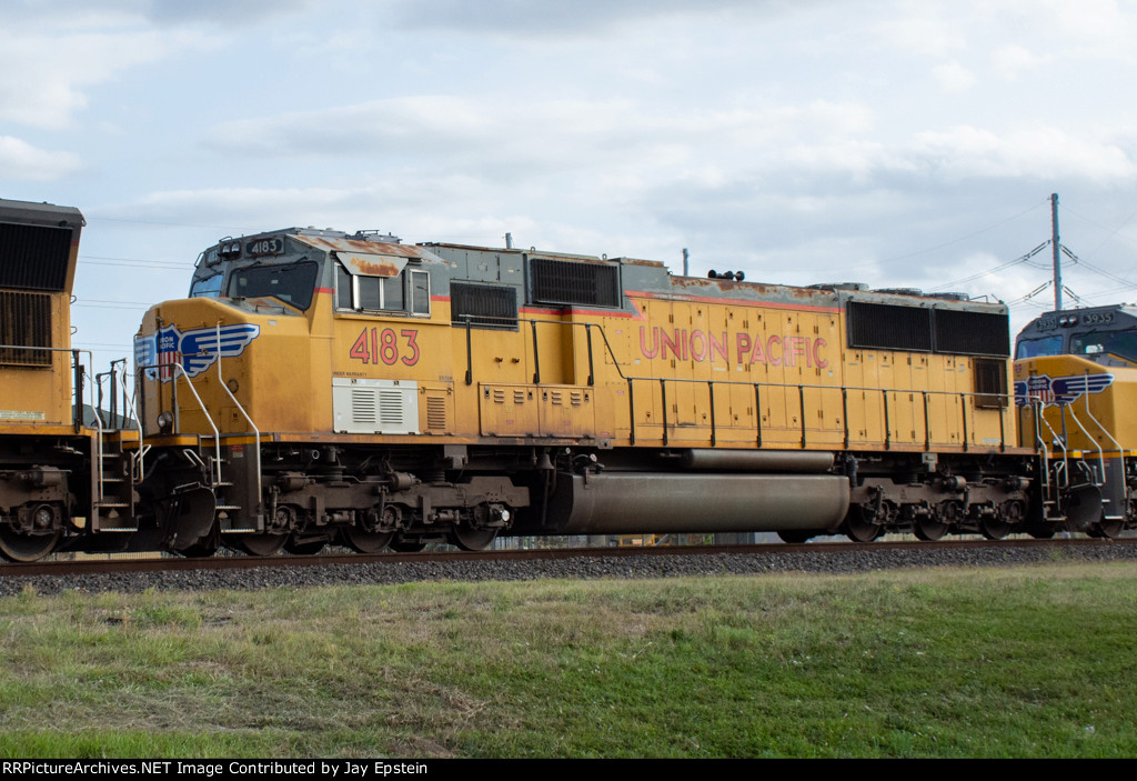 UP 4383 trails on an eastbound manifest